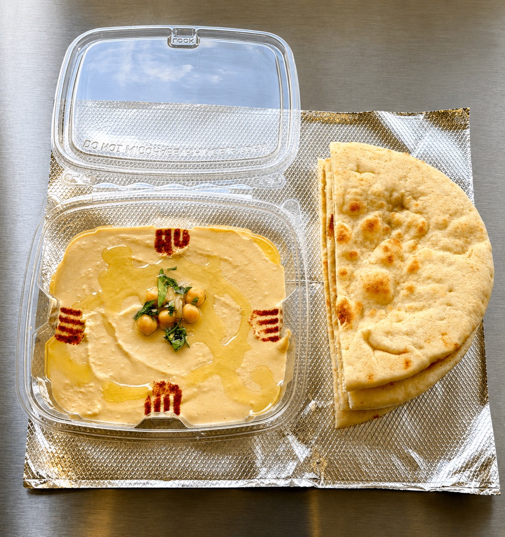 Homemade hummus with warm pita